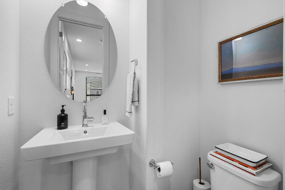 2050 Lohmans Spur Road, Unit 2301 Lakeway, TX 78734 - Photo 22 of 27 Half bath featuring a textured wall