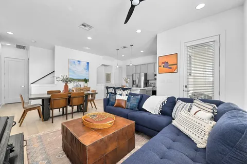 a living room with furniture and a couch