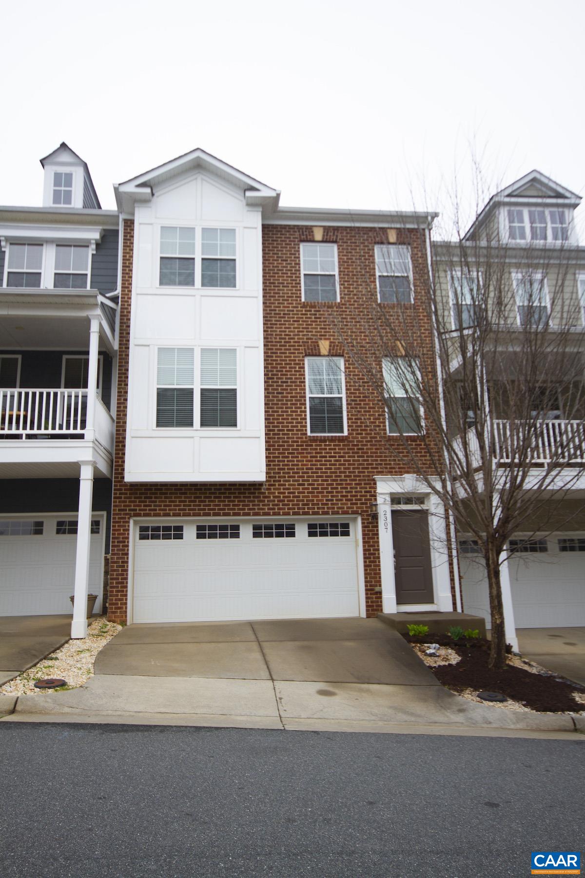 2307 Avinity Court Charlottesville, VA 22902 - Photo 1 of 35 a front view of a building with a road