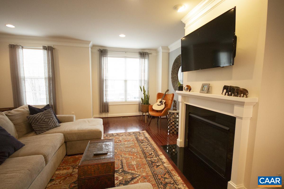 2307 Avinity Court Charlottesville, VA 22902 - Photo 5 of 35 a living room with furniture and a flat screen tv
