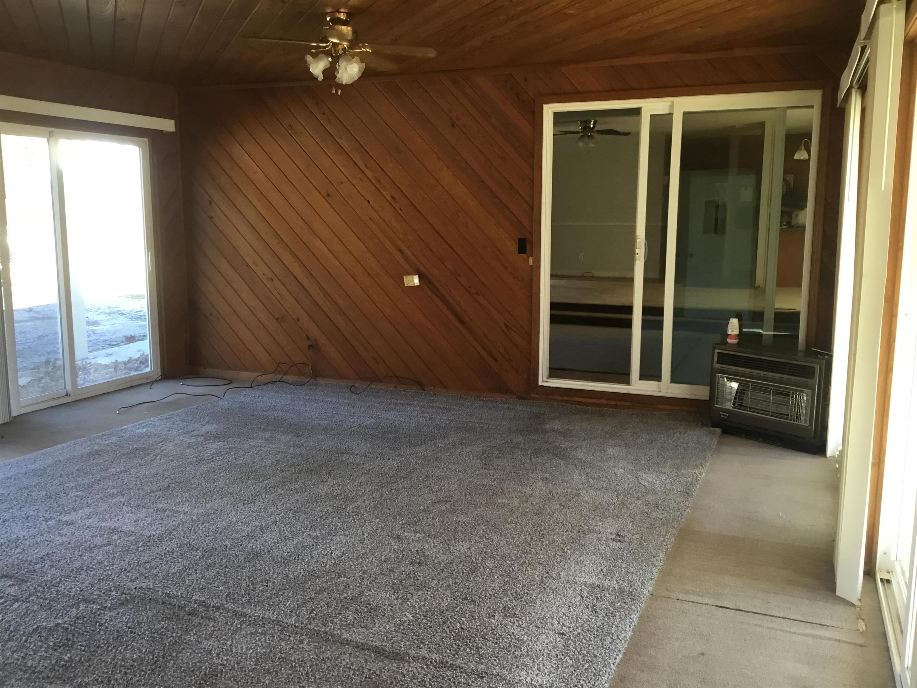 367 Crabtree Road Selmer, TN 38375 - Photo 11 of 23 wooden floor and window in an empty room