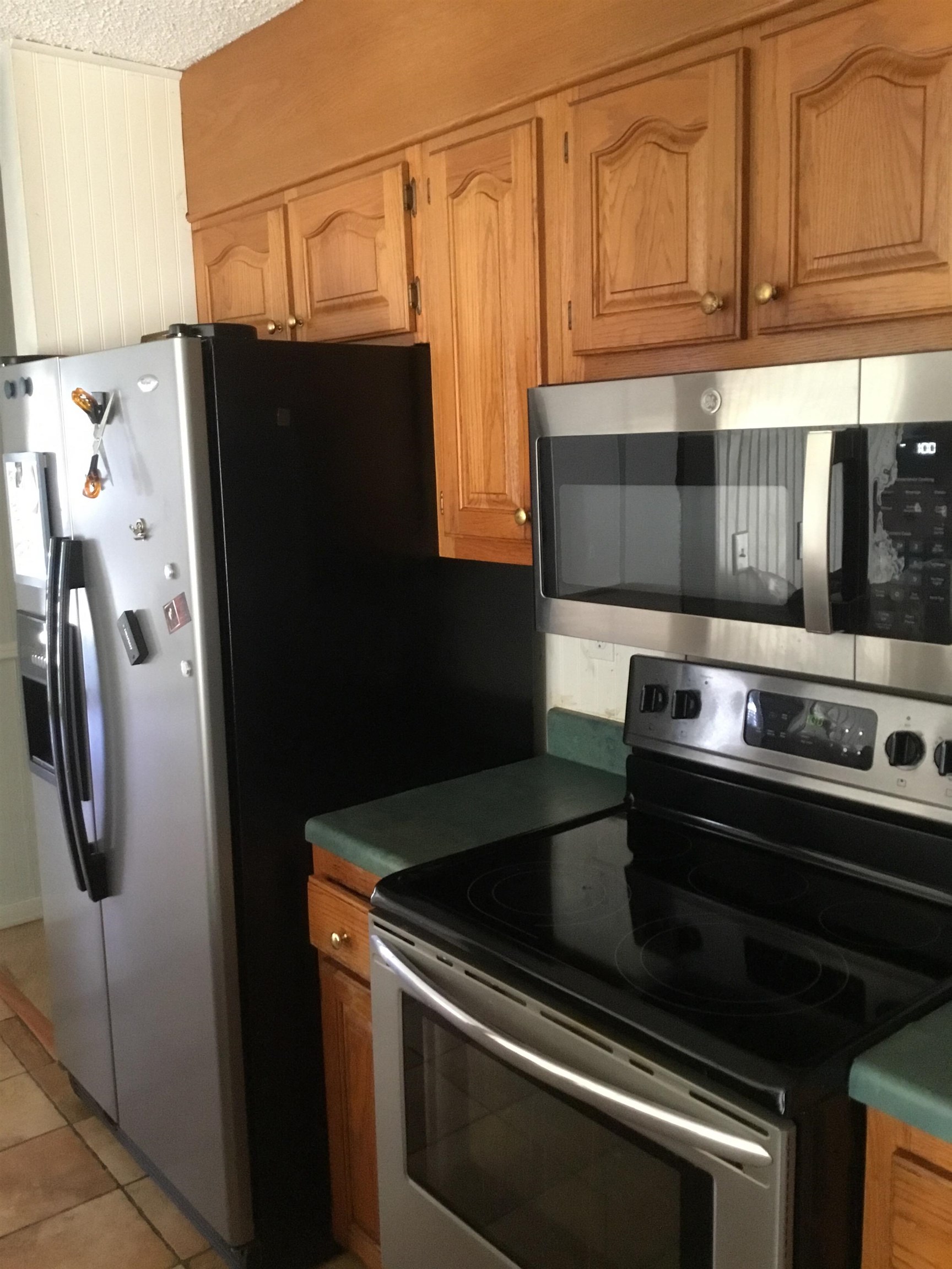 367 Crabtree Road Selmer, TN 38375 - Photo 4 of 23 a close view of a stove top oven and cabinets