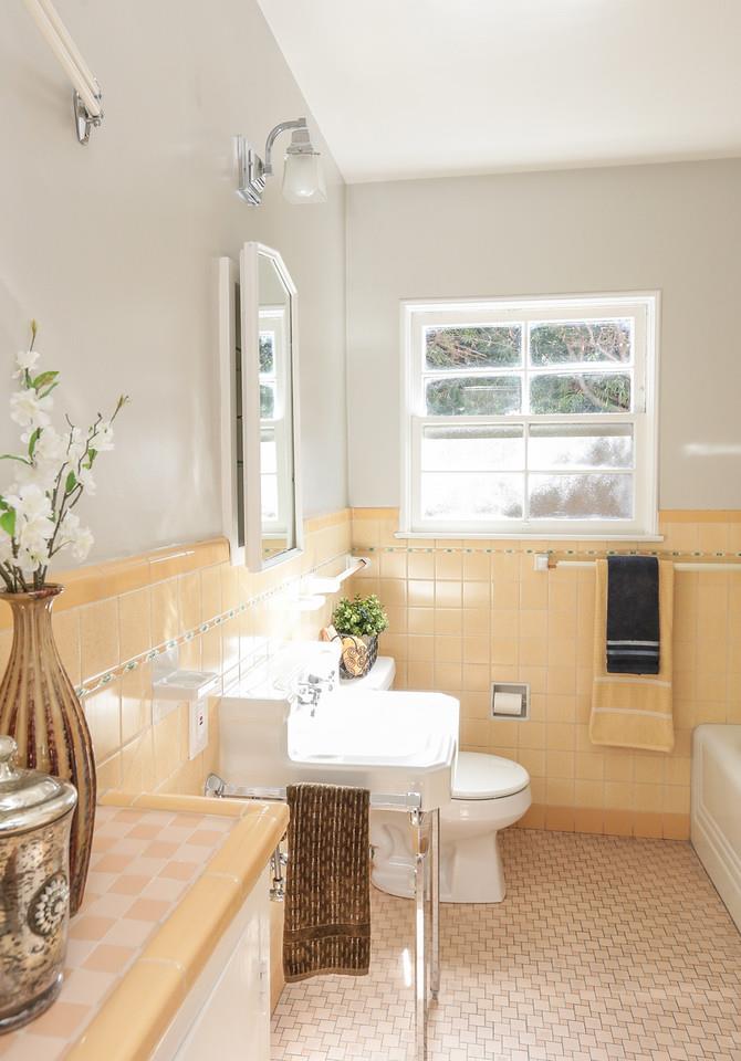 2160 Middlefield Road Palo Alto, CA 94301 - Photo 15 of 24 a bathroom with a sink a toilet and mirror