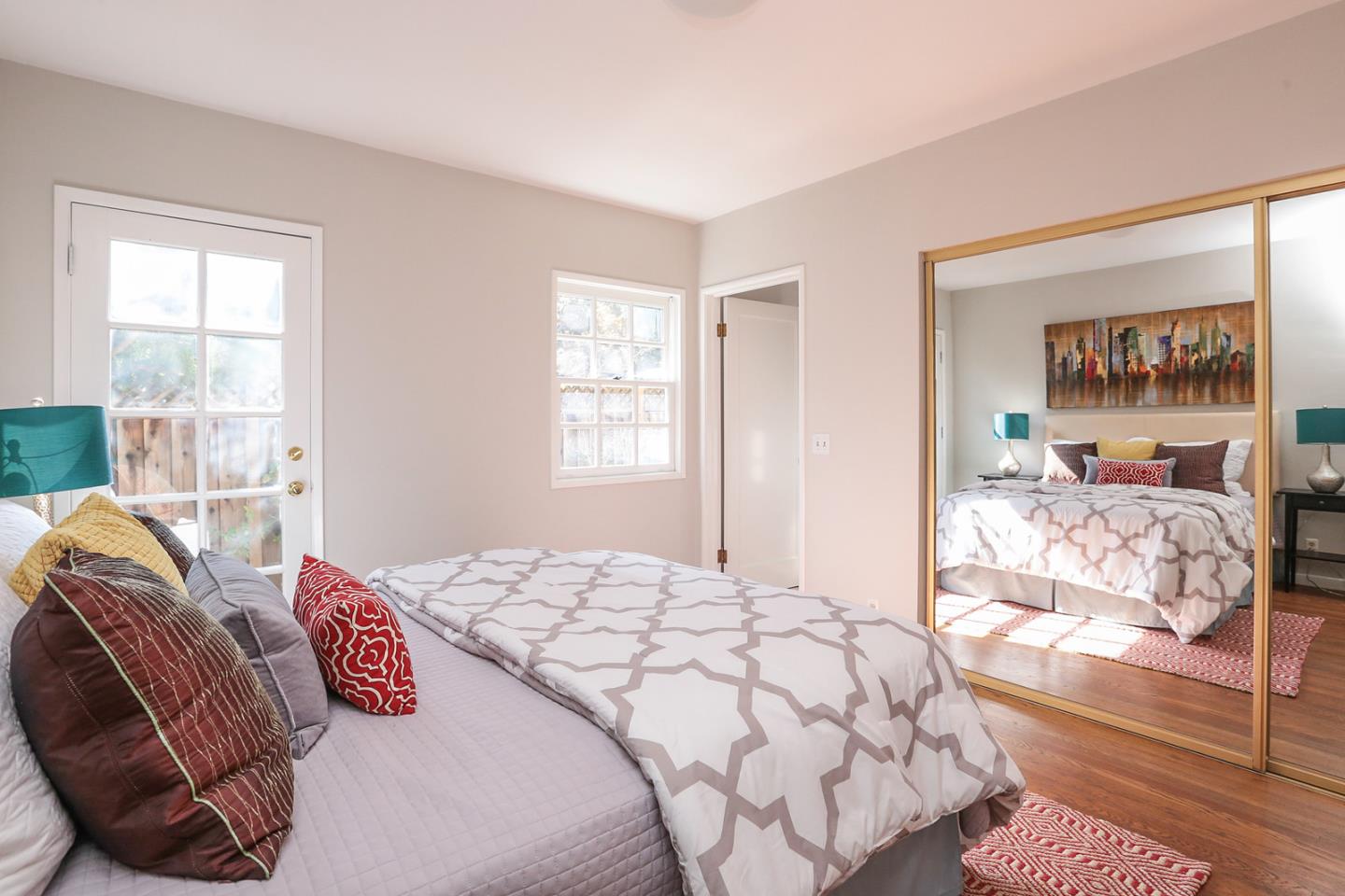 2160 Middlefield Road Palo Alto, CA 94301 - Photo 16 of 24 a bedroom with a large bed and a window