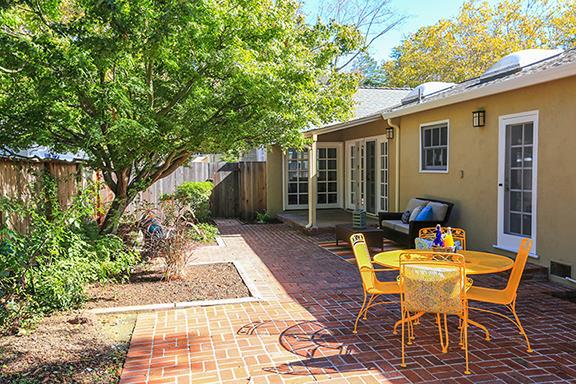 2160 Middlefield Road Palo Alto, CA 94301 - Photo 19 of 24 a backyard of a house with table and chairs