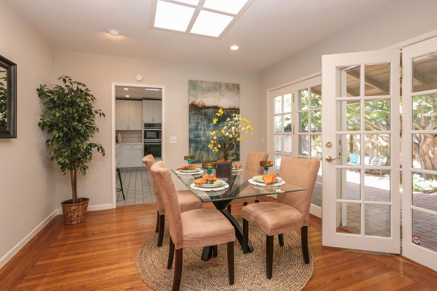 2160 Middlefield Road Palo Alto, CA 94301 - Photo 7 of 24 a dining room with furniture window and wooden floor