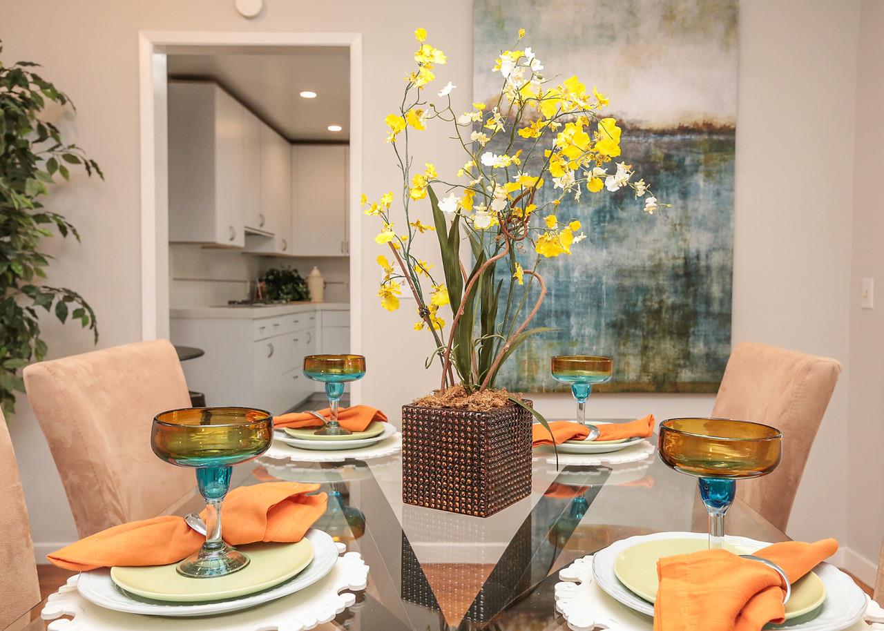 2160 Middlefield Road Palo Alto, CA 94301 - Photo 8 of 24 a dining room with furniture and a vase