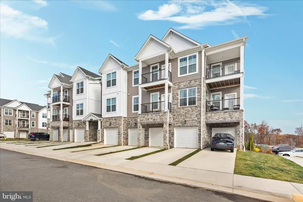 a front view of a building with a street