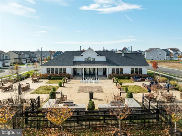 a view of a swimming pool with lounge chairs