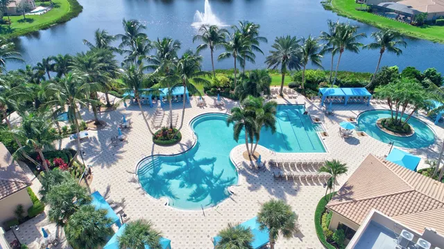 a view of a swimming pool with a patio