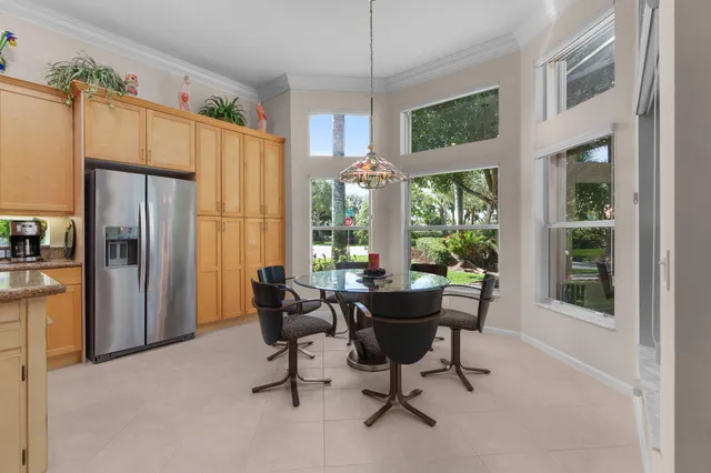 a dining room with furniture a livingroom and outdoor view