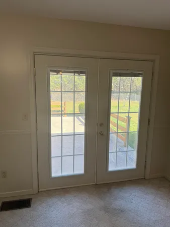 a view of hallway with shower