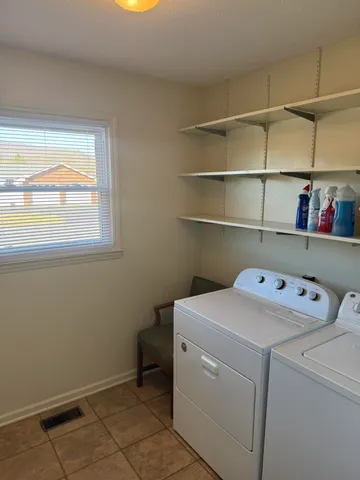 a bathroom with a bath tub and a shower