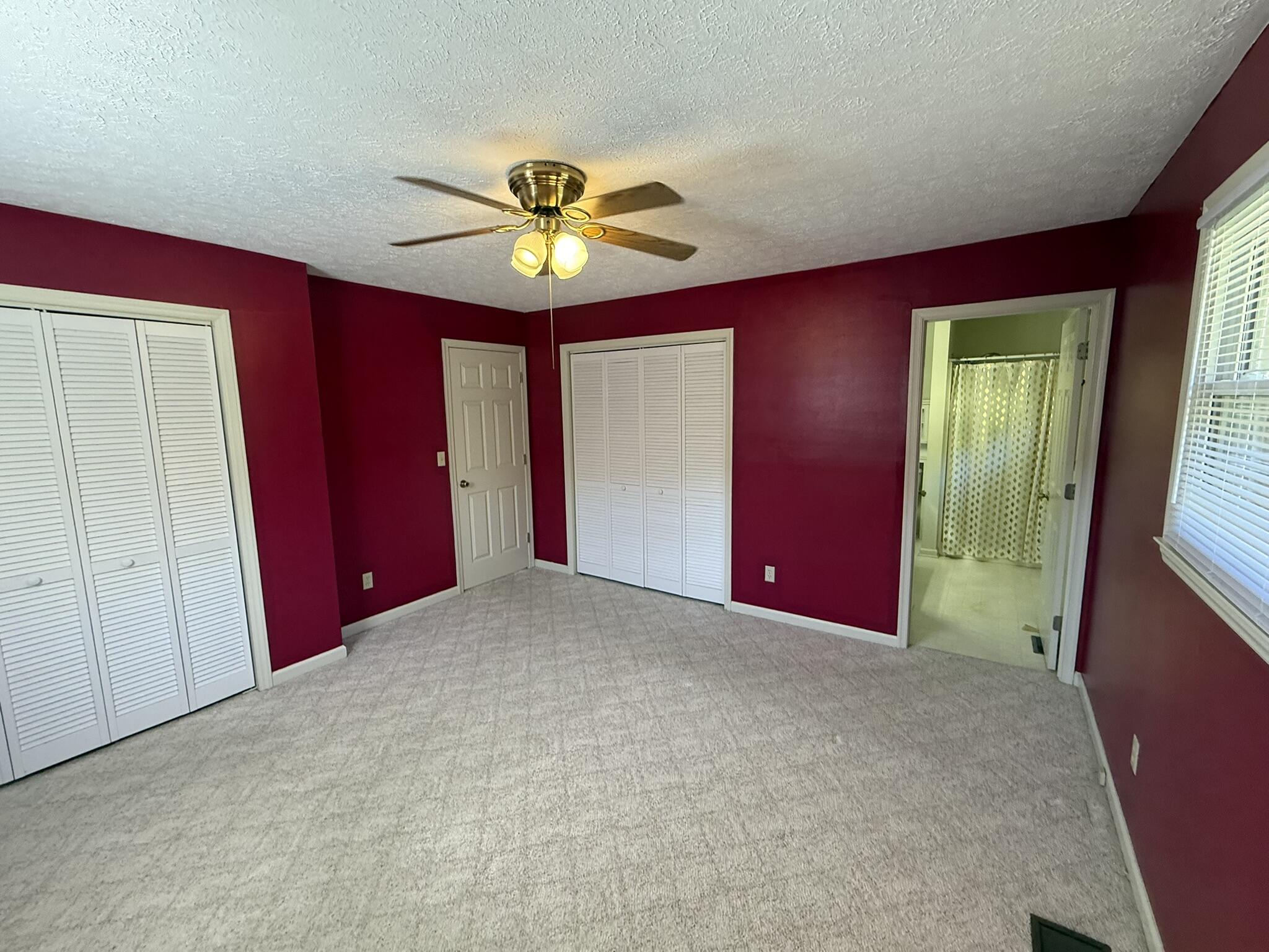 200 Sherry May Street Covington, VA 24426 - Photo 41 of 57 an empty room with windows and fan