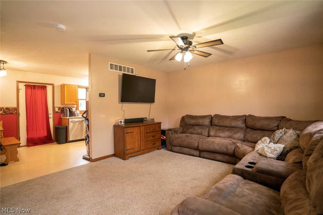 54 Elm Street Rittman, OH 44270 - Photo 10 of 35 Large Living Room with ceiling fan.