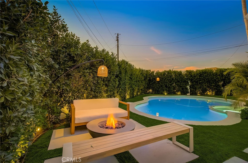 8161 Encino Avenue Northridge, CA 91325 - Photo 11 of 72 a view of outdoor space yard swimming pool and furniture
