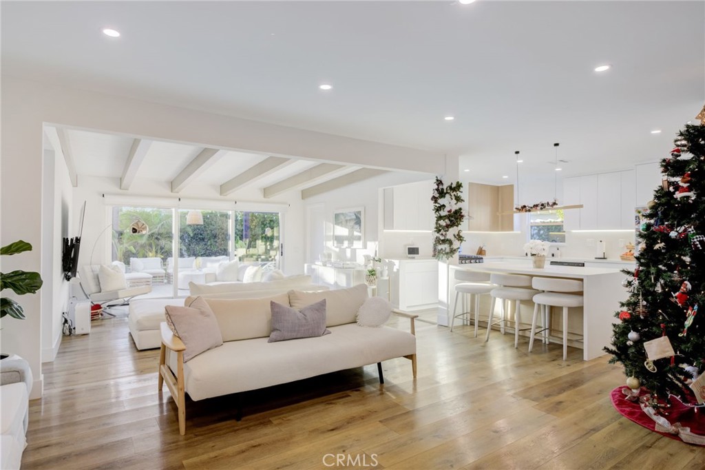 8161 Encino Avenue Northridge, CA 91325 - Photo 28 of 72 a living room with furniture and a large window
