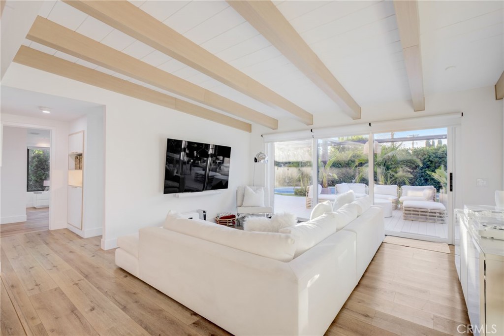 8161 Encino Avenue Northridge, CA 91325 - Photo 30 of 72 a living room with furniture large window and flat screen tv