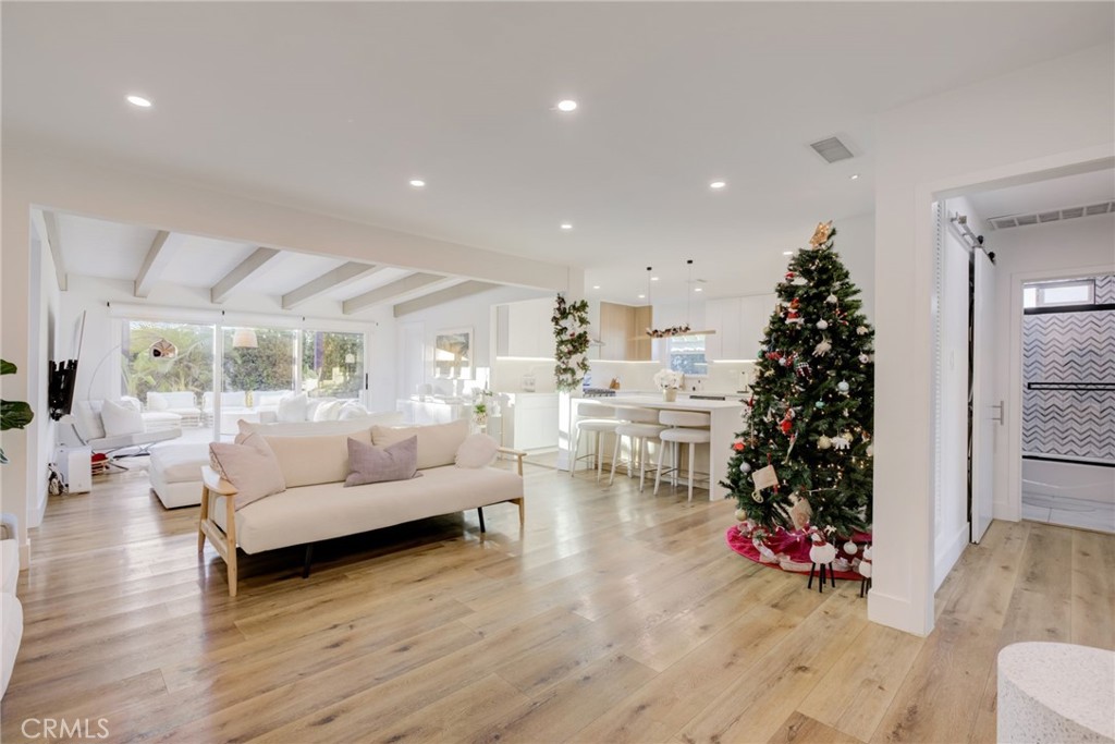 8161 Encino Avenue Northridge, CA 91325 - Photo 33 of 72 a living room with furniture and a christmas tree