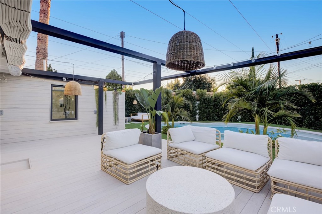 8161 Encino Avenue Northridge, CA 91325 - Photo 54 of 72 a living room with furniture and a large window