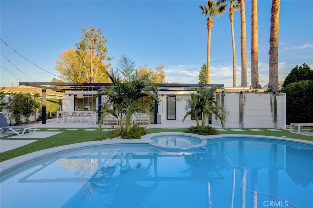 8161 Encino Avenue Northridge, CA 91325 - Photo 57 of 72 a view of a house with backyard and a patio