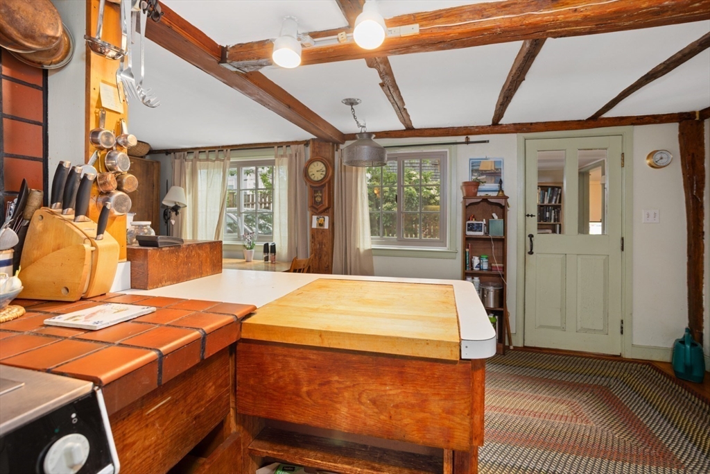 16 Pine Street Gloucester, MA 01930 - Photo 12 of 42 a outdoor space with a bed