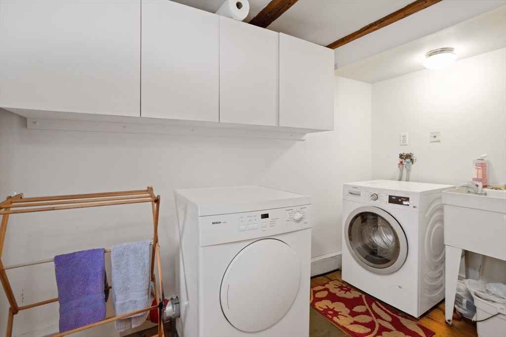 16 Pine Street Gloucester, MA 01930 - Photo 18 of 42 a utility room with dryer and washer