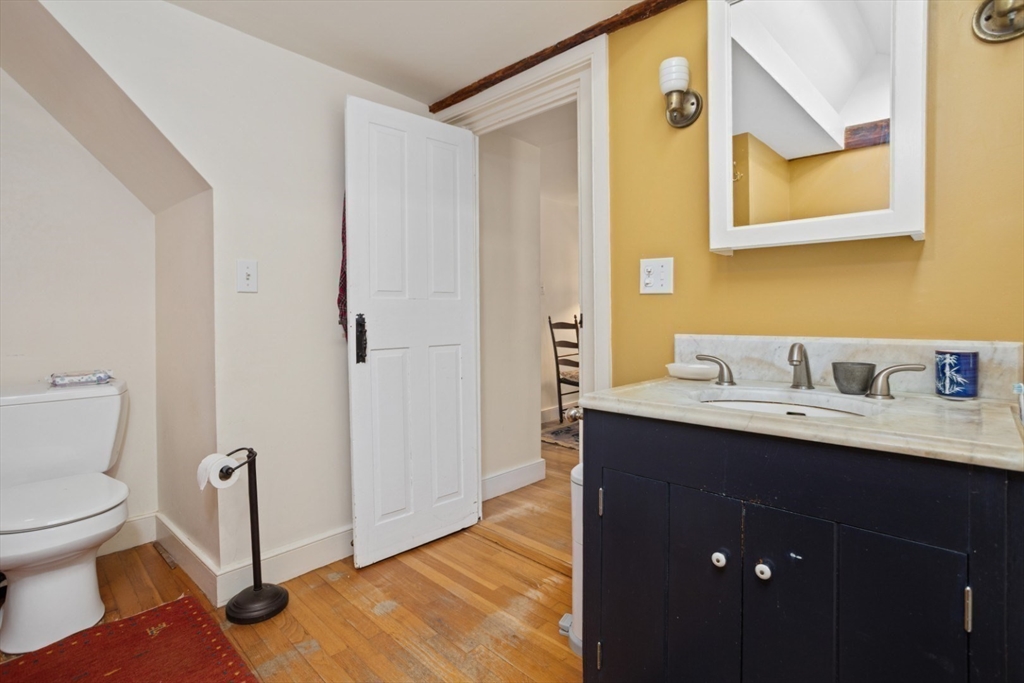 16 Pine Street Gloucester, MA 01930 - Photo 30 of 42 a bathroom with a sink and a toilet