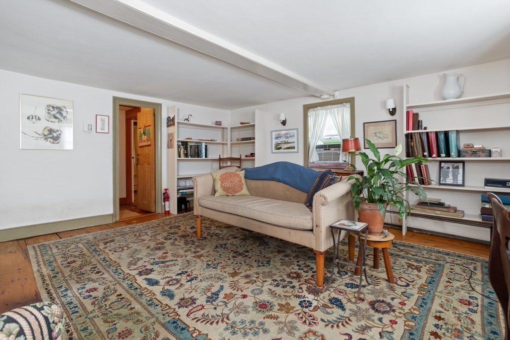 16 Pine Street Gloucester, MA 01930 - Photo 4 of 42 a living room with furniture and a rug