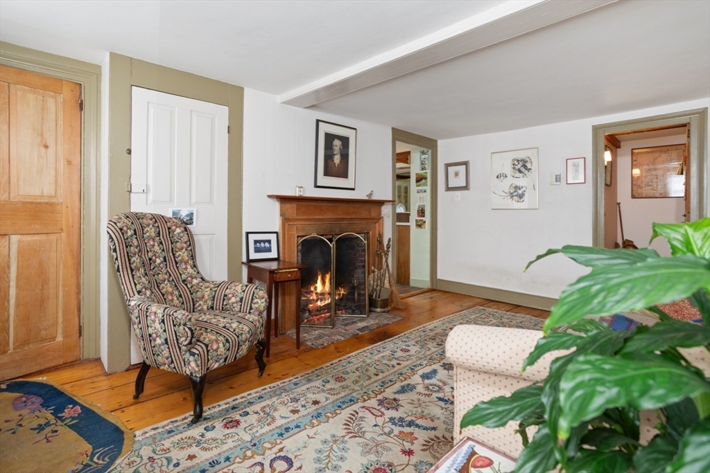 16 Pine Street Gloucester, MA 01930 - Photo 5 of 42 a living room with furniture and a fireplace