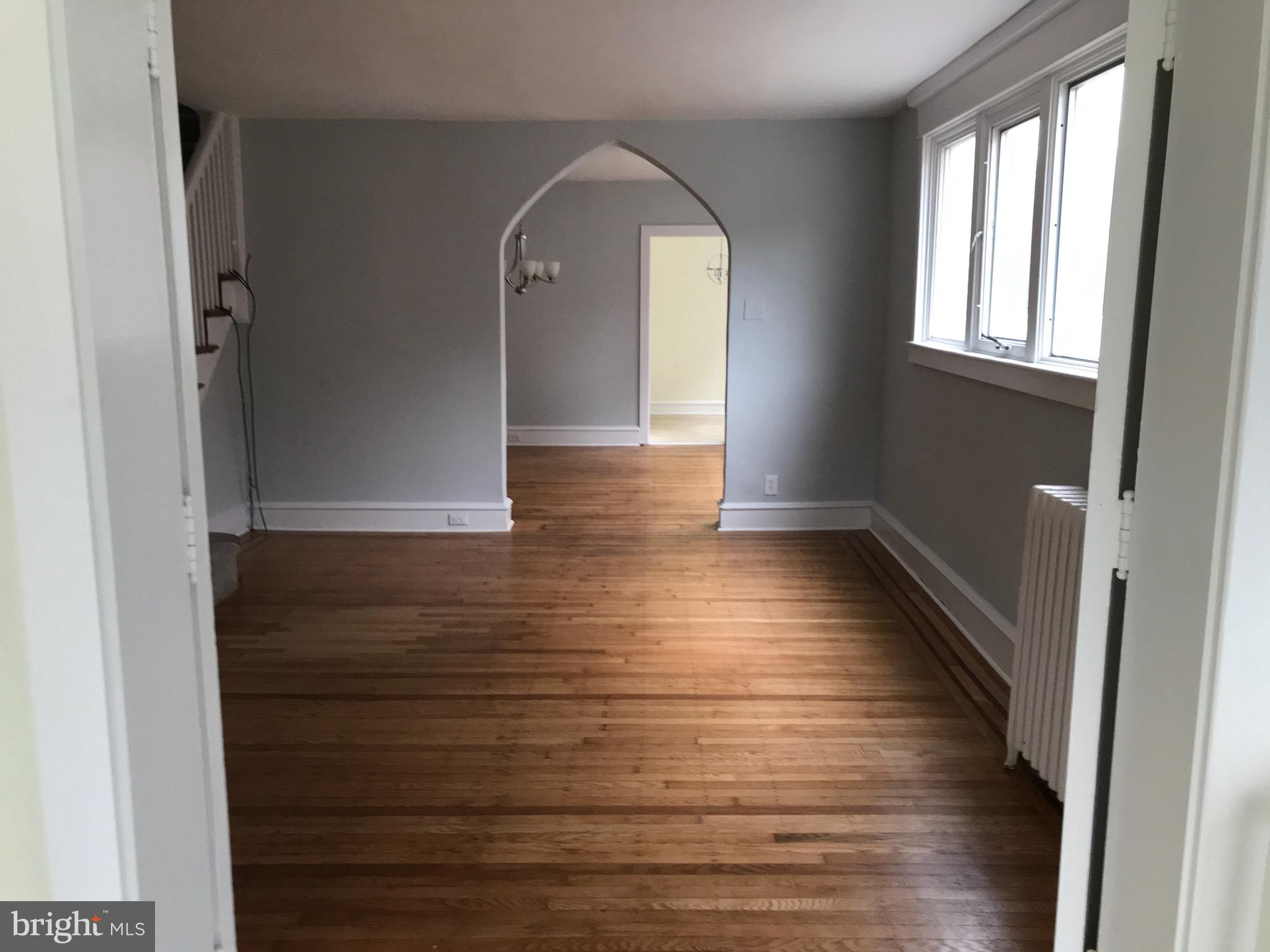 33 Wayne Avenue Springfield, PA 19064 - Photo 13 of 27 Looking from Sunroom to living room to dining room