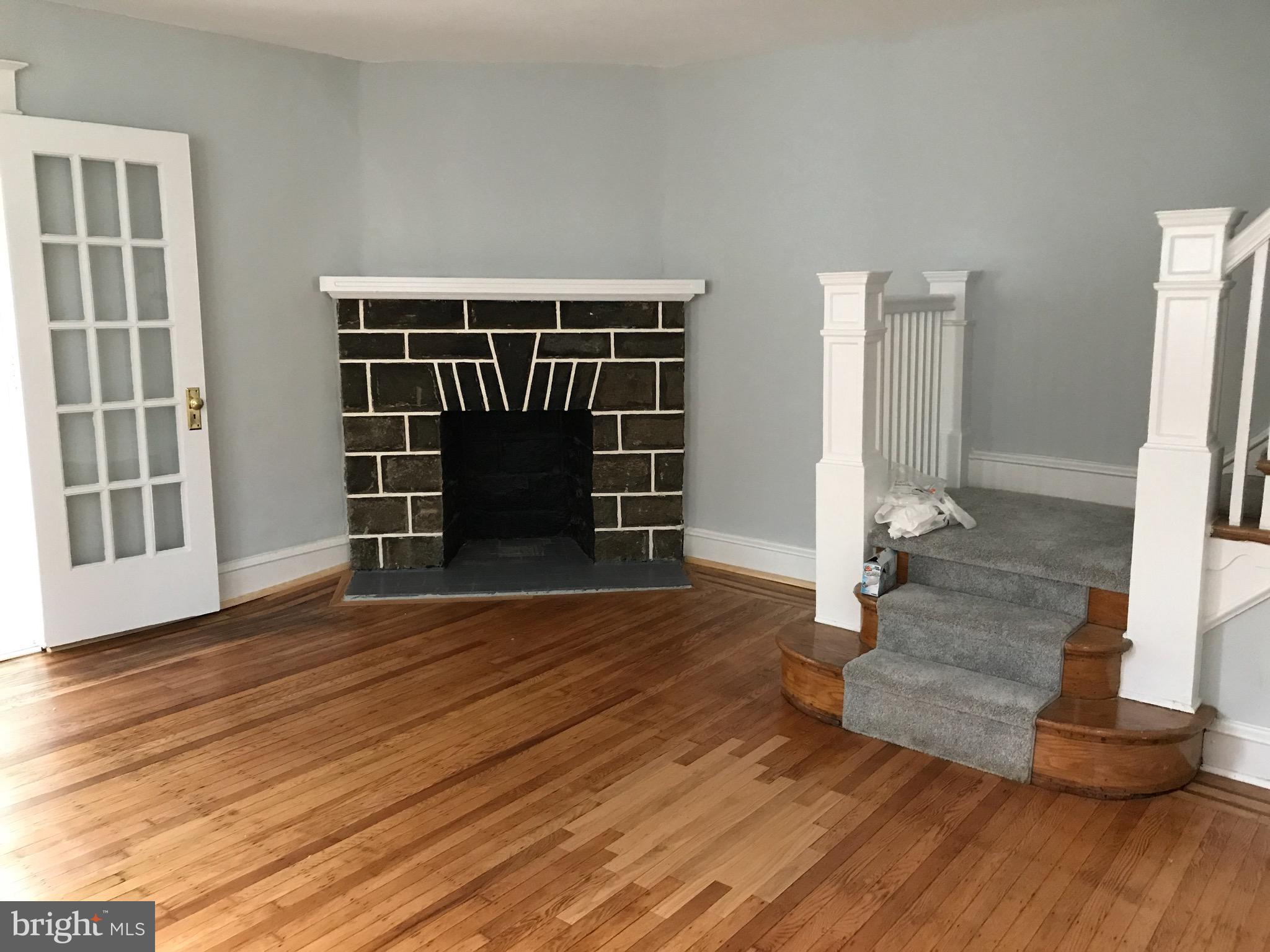 33 Wayne Avenue Springfield, PA 19064 - Photo 17 of 27 Living room with fireplace