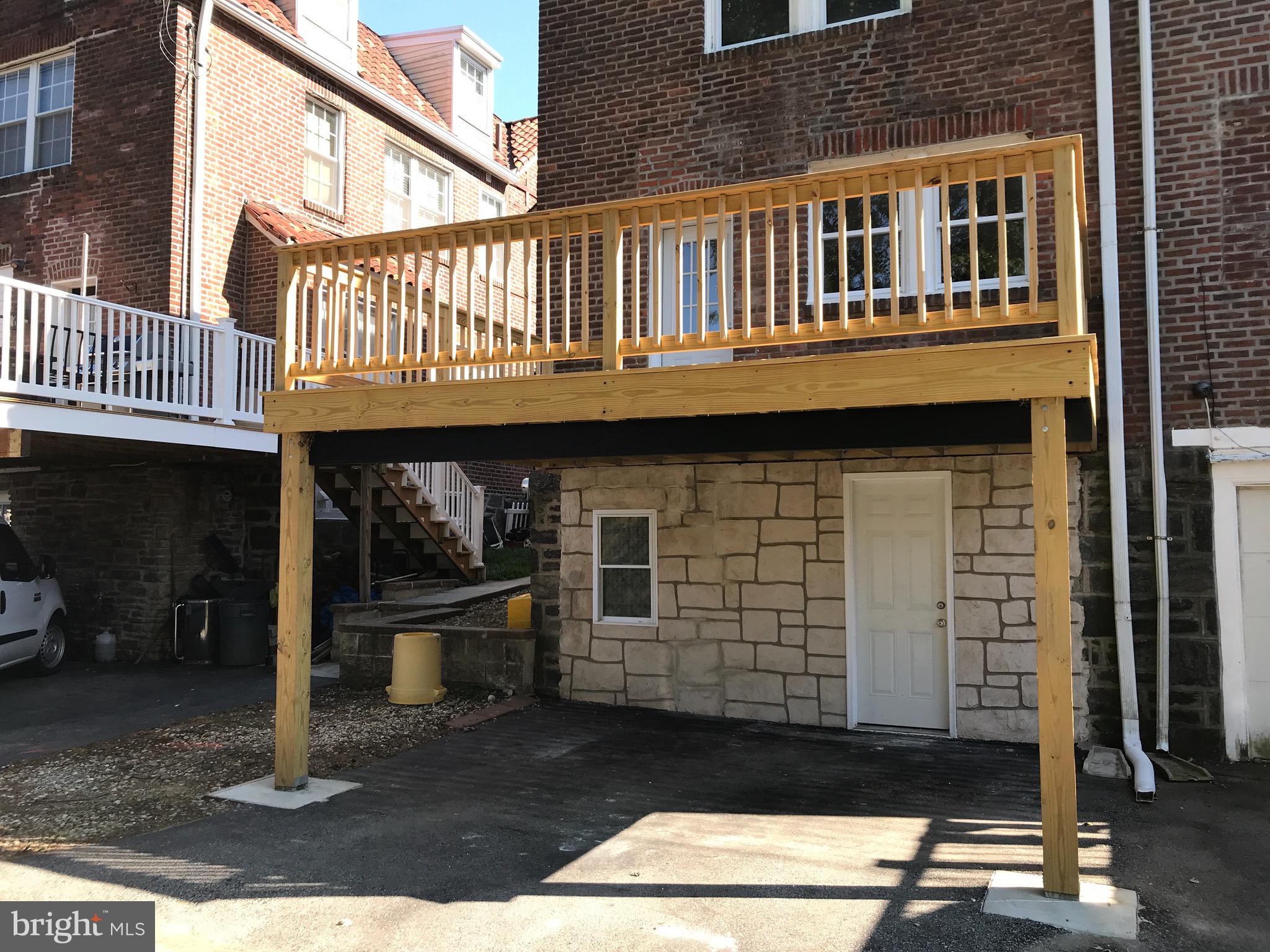 33 Wayne Avenue Springfield, PA 19064 - Photo 5 of 27 New Deck, entrance to basement, parking