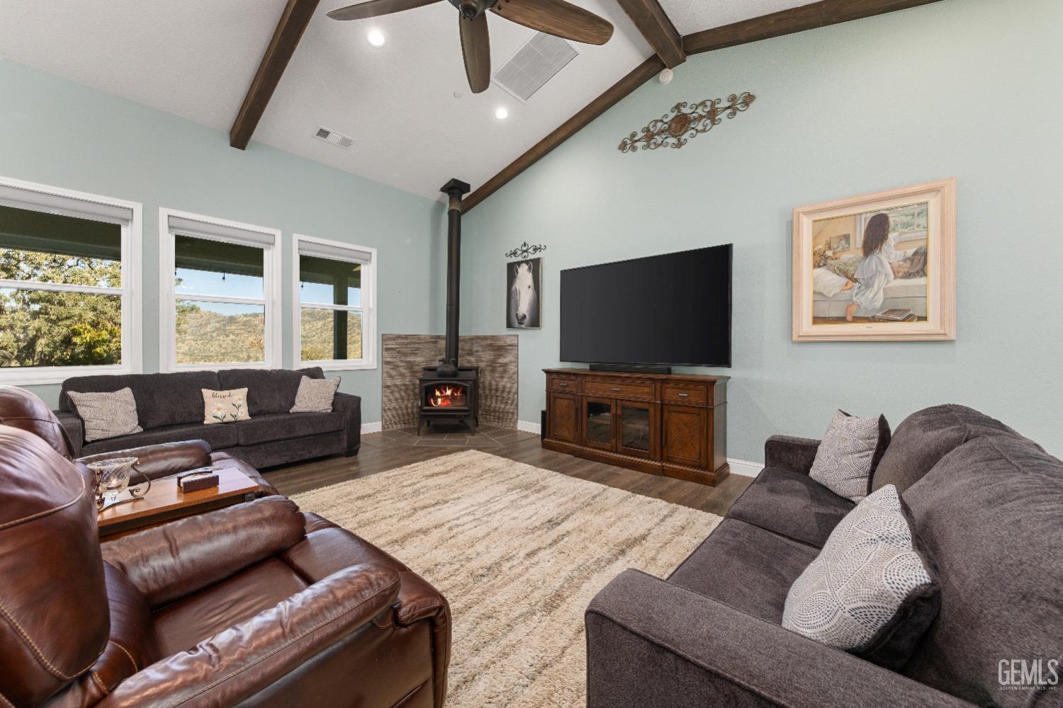 Undisclosed Address Tehachapi, CA 93561 - Photo 11 of 43 a living room with furniture and a flat screen tv