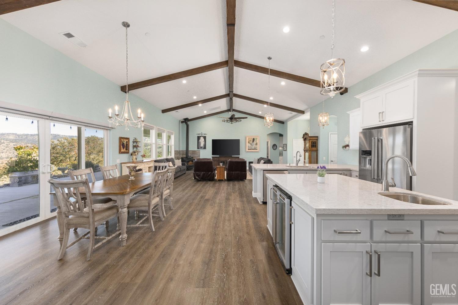 Undisclosed Address Tehachapi, CA 93561 - Photo 14 of 43 a large kitchen with a table and chairs