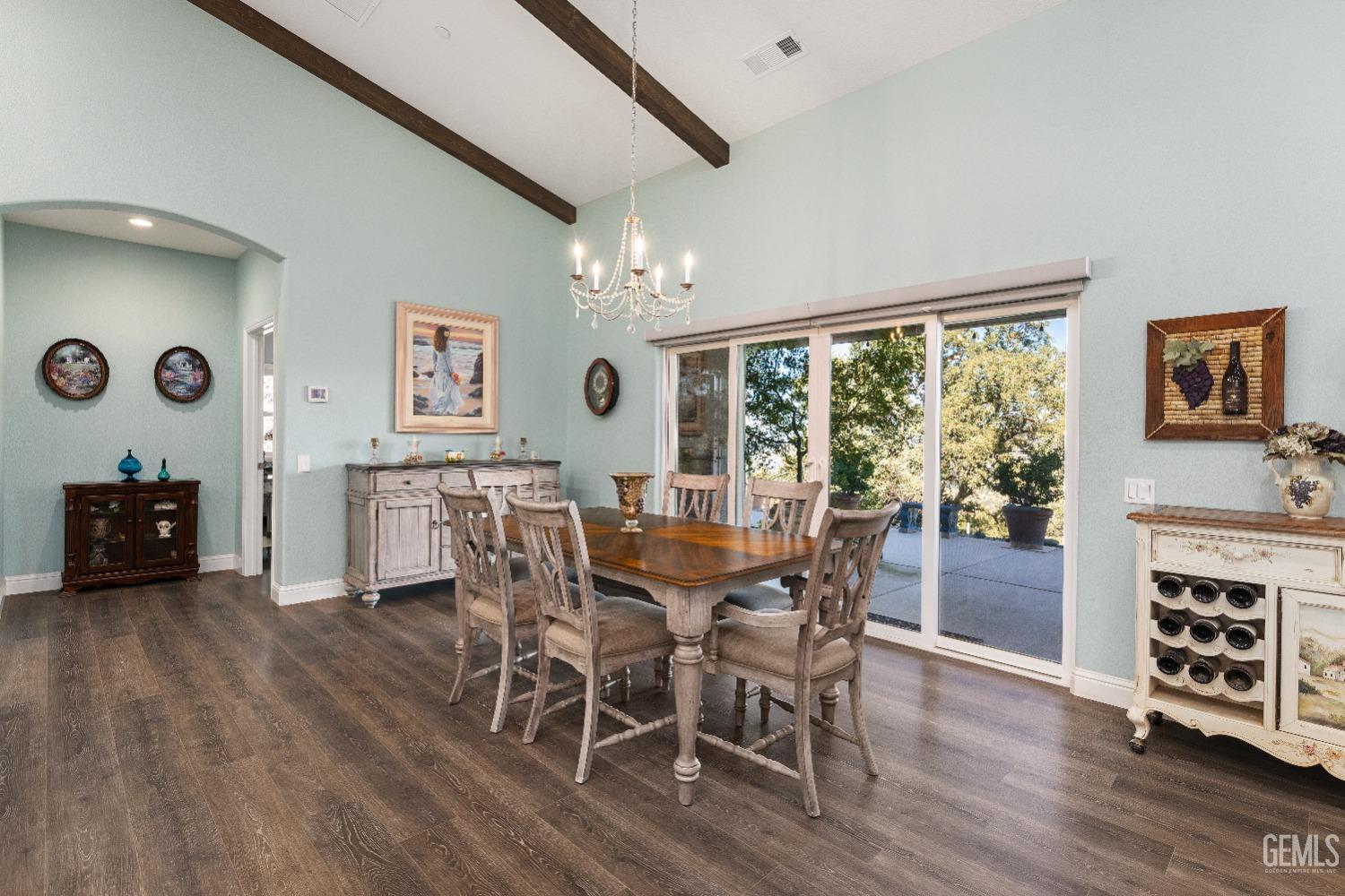 Undisclosed Address Tehachapi, CA 93561 - Photo 19 of 43 a view of a dining room with furniture window and wooden floor