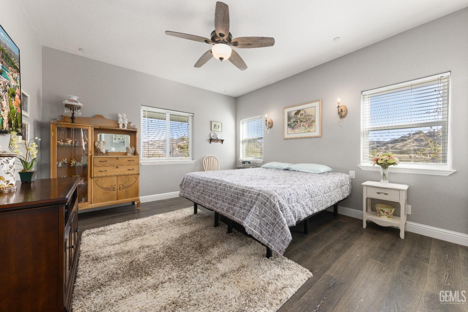 Undisclosed Address Tehachapi, CA 93561 - Photo 30 of 43 a bedroom with a bed a table and chair