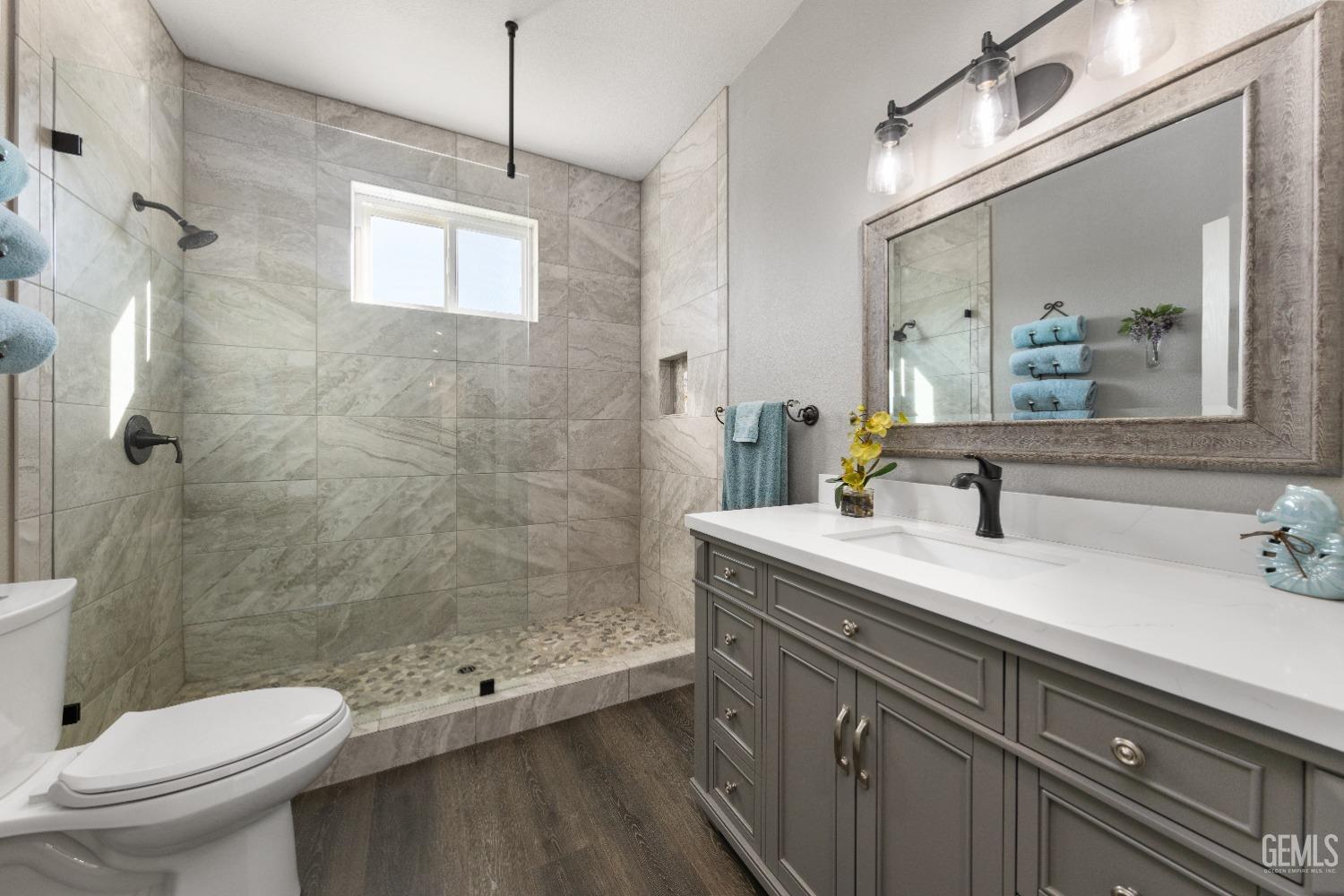 Undisclosed Address Tehachapi, CA 93561 - Photo 32 of 43 a bathroom with a sink a toilet and shower