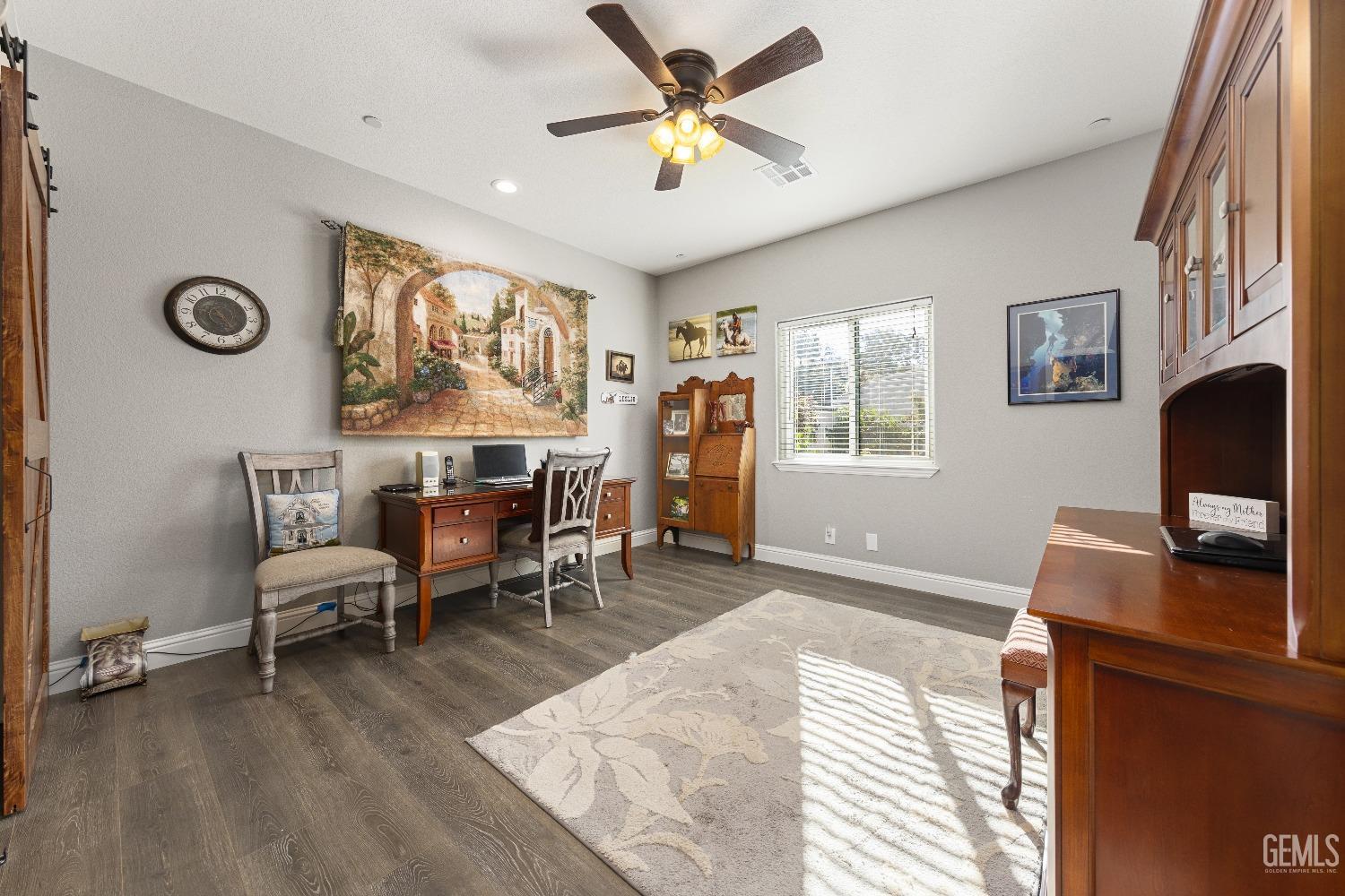 Undisclosed Address Tehachapi, CA 93561 - Photo 33 of 43 a workspace with wooden floor and a window