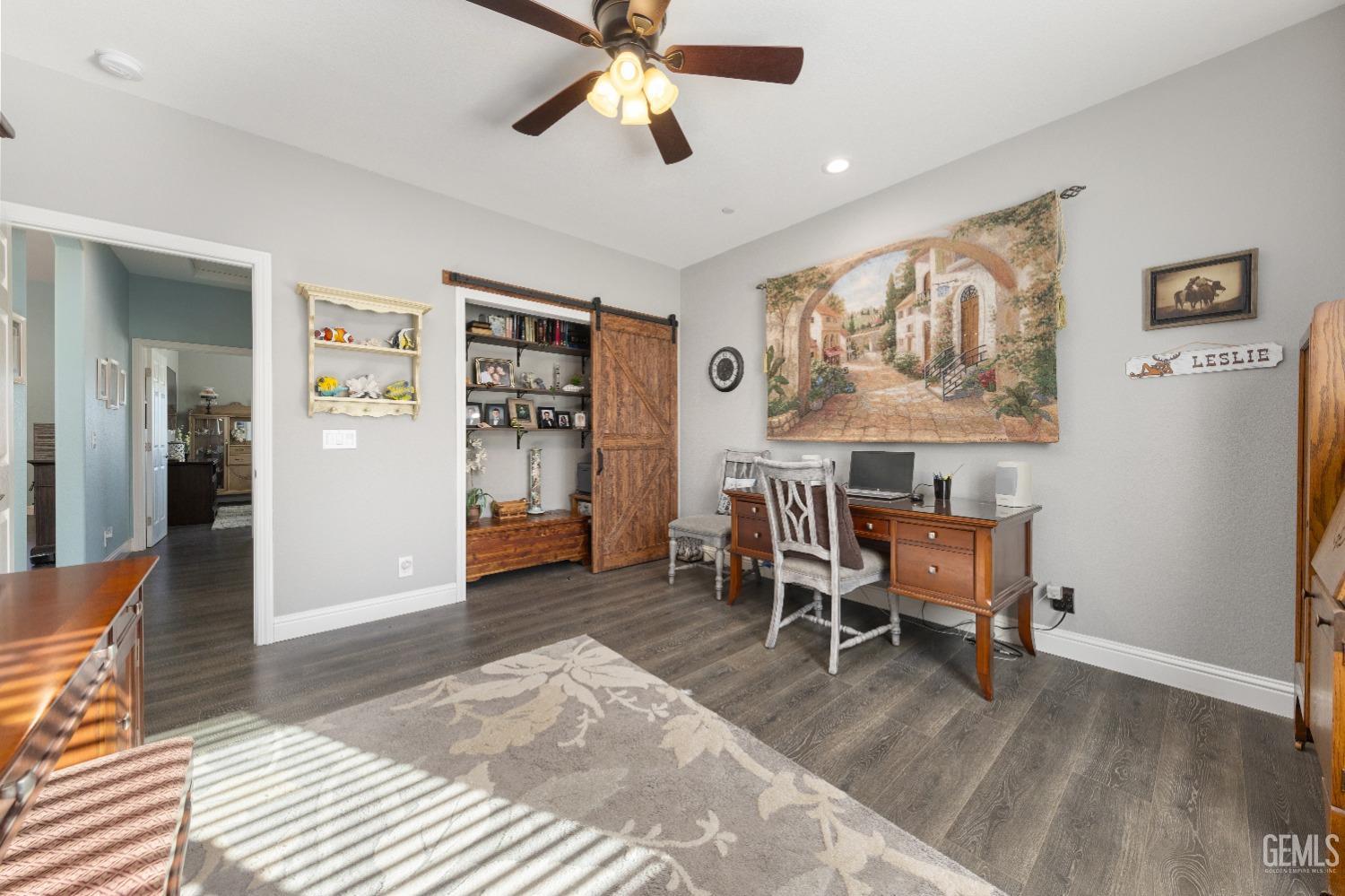 Undisclosed Address Tehachapi, CA 93561 - Photo 34 of 43 a living room with furniture and paintings on the wall