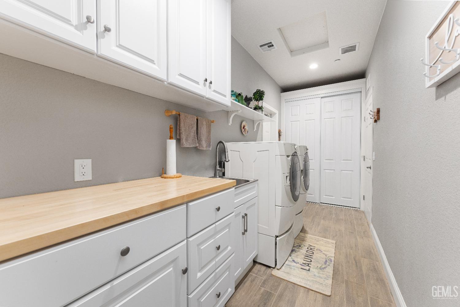 Undisclosed Address Tehachapi, CA 93561 - Photo 35 of 43 a room with a sink and cabinets