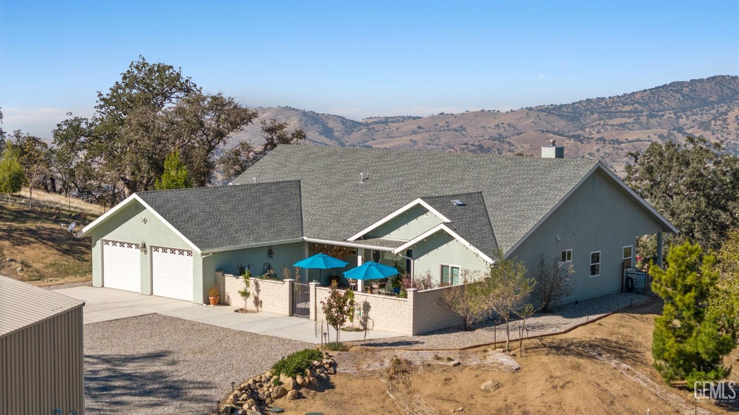 Undisclosed Address Tehachapi, CA 93561 - Photo 5 of 43 a view of a house with a yard