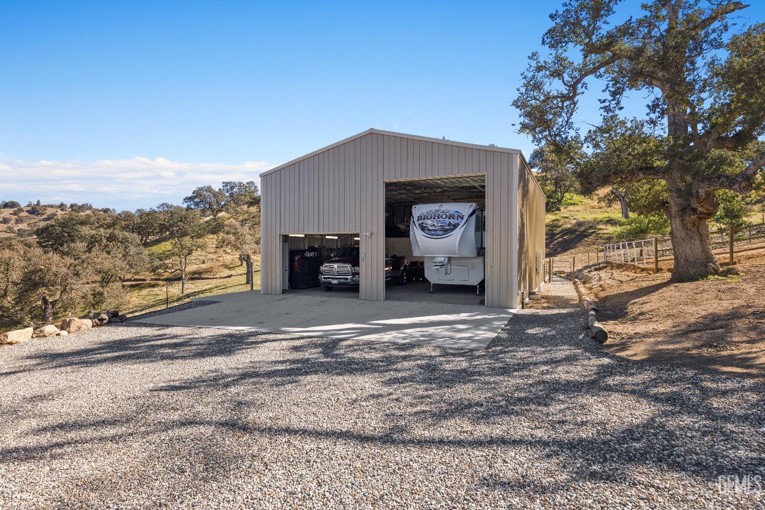 Undisclosed Address Tehachapi, CA 93561 - Photo 7 of 43 a view of a car parked in front of a house
