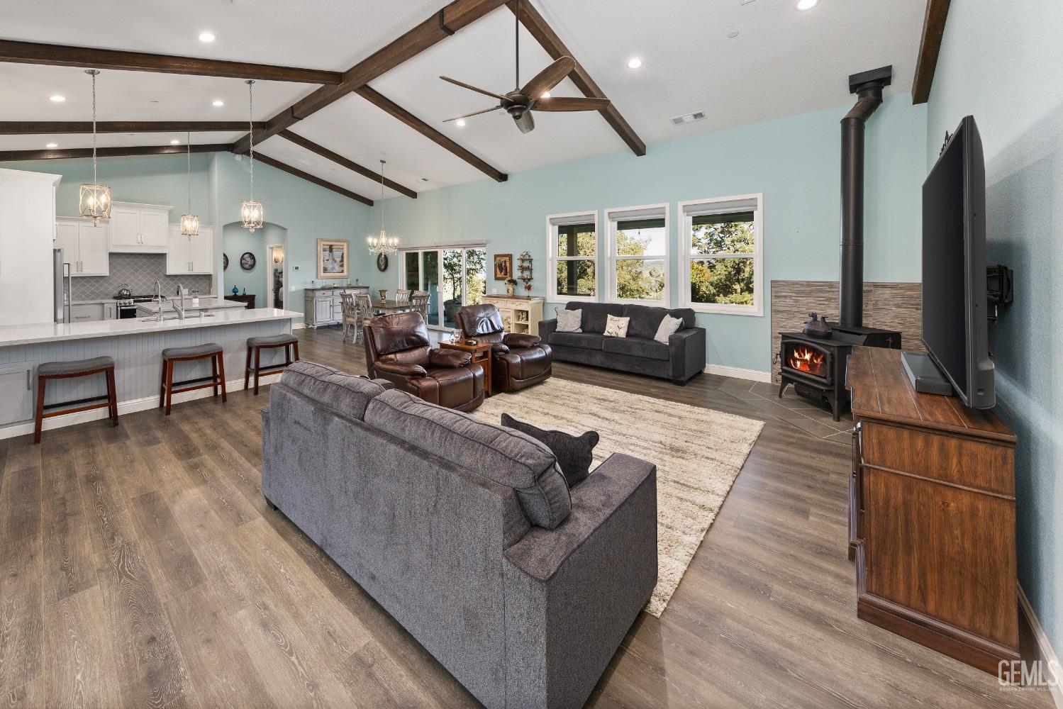 Undisclosed Address Tehachapi, CA 93561 - Photo 10 of 43 a living room with furniture and a flat screen tv