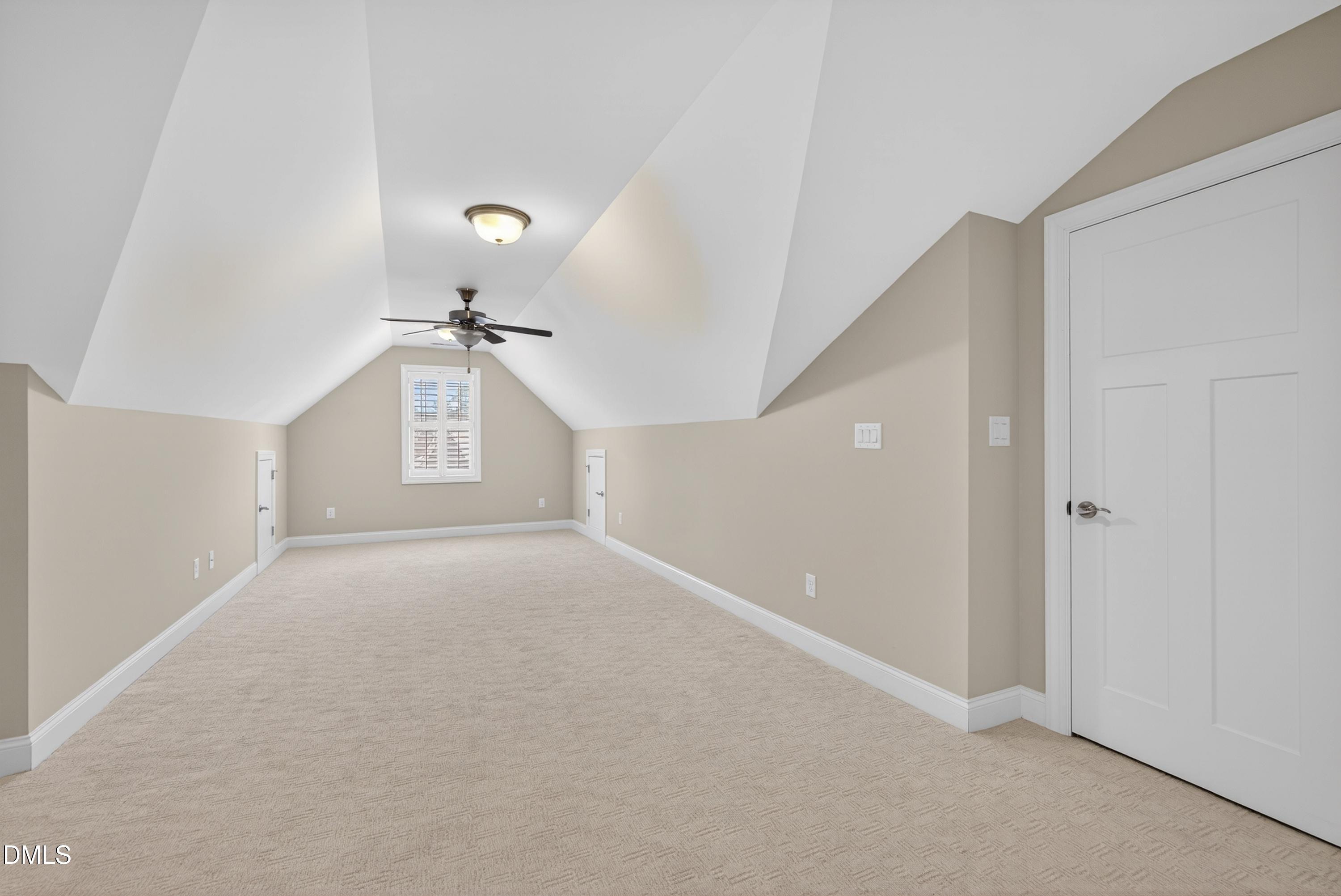 121 Telluride Trail Garner, NC 27529 - Photo 23 of 41 a view of a room with a ceiling fan and window