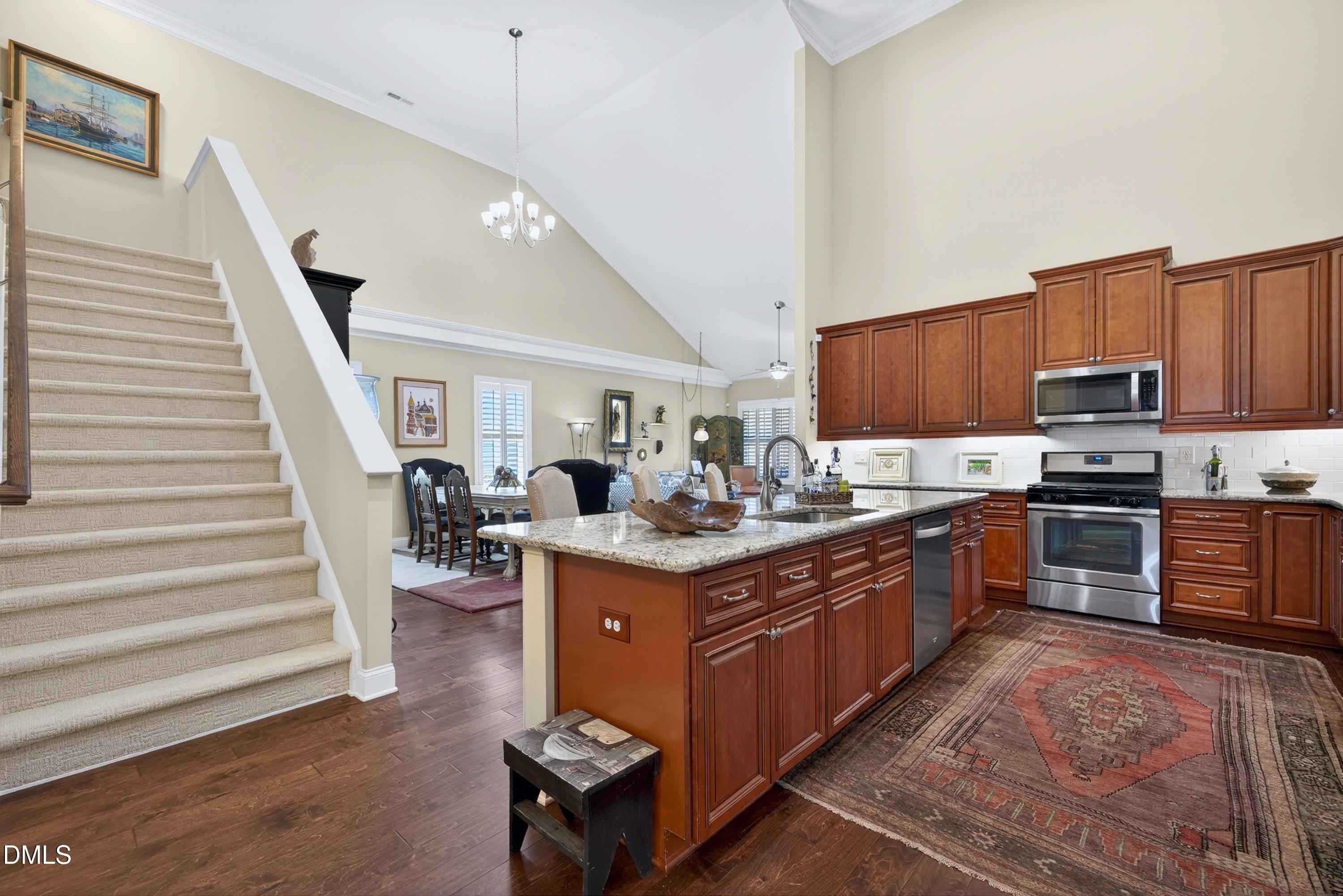 121 Telluride Trail Garner, NC 27529 - Photo 26 of 41 a kitchen with granite countertop lots of counter top space and stainless steel appliances