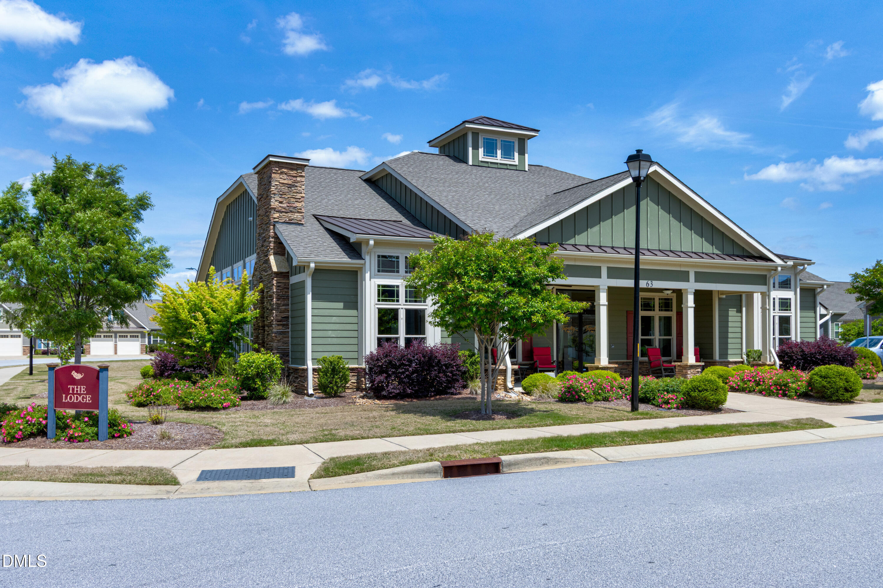 121 Telluride Trail Garner, NC 27529 - Photo 31 of 41 a front view of a house with a yard and potted plants