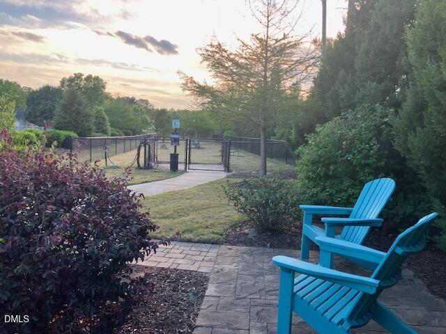 121 Telluride Trail Garner, NC 27529 - Photo 38 of 41 a view of a chair and table in the garden