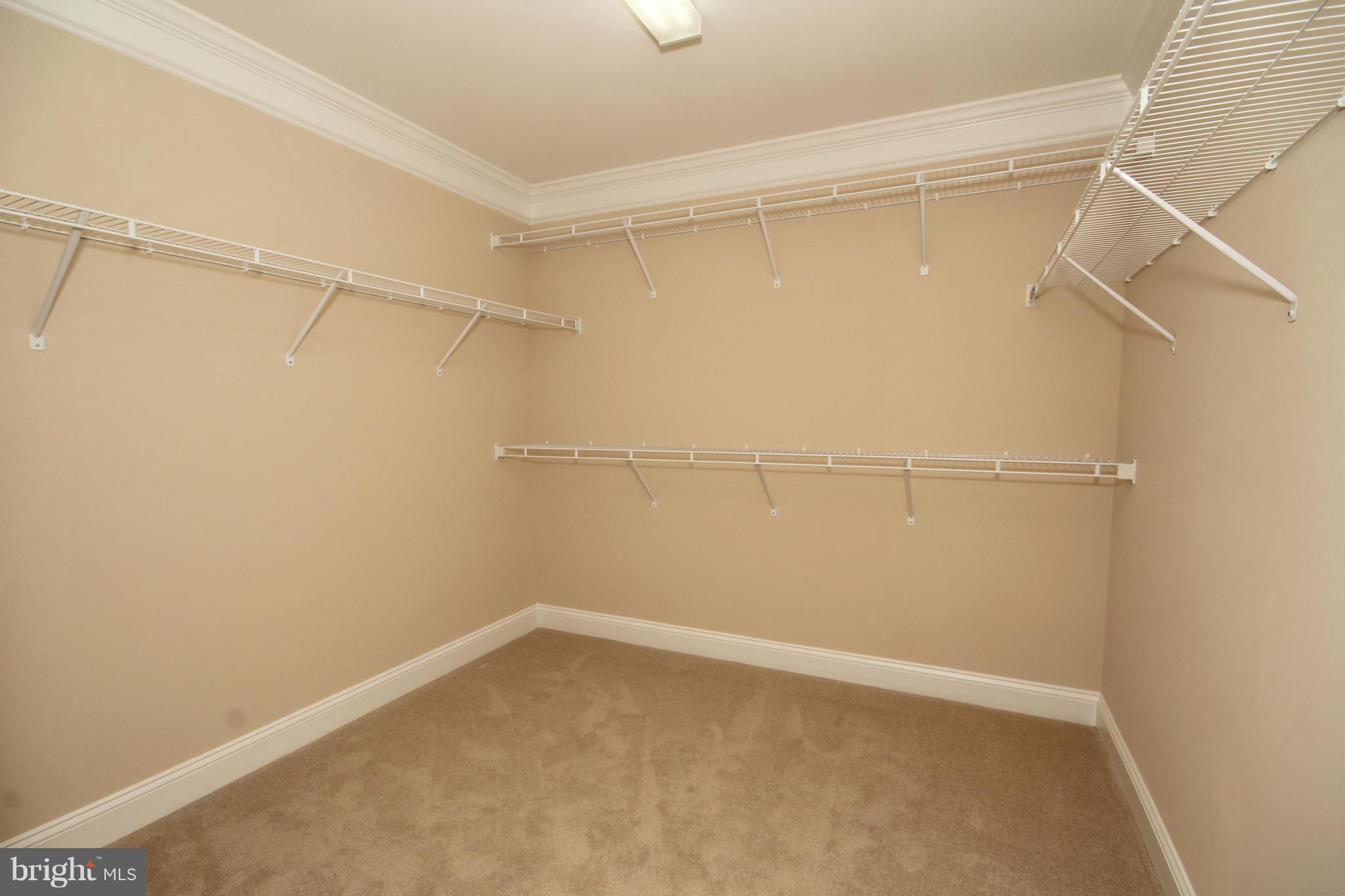 9421 Rogues Road Midland, VA 22728 - Photo 22 of 30 1 of 2 Master Walk-in Closets