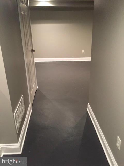 7005 Kenleigh Road Baltimore, MD 21212 - Photo 25 of 29 Basement Hallway
